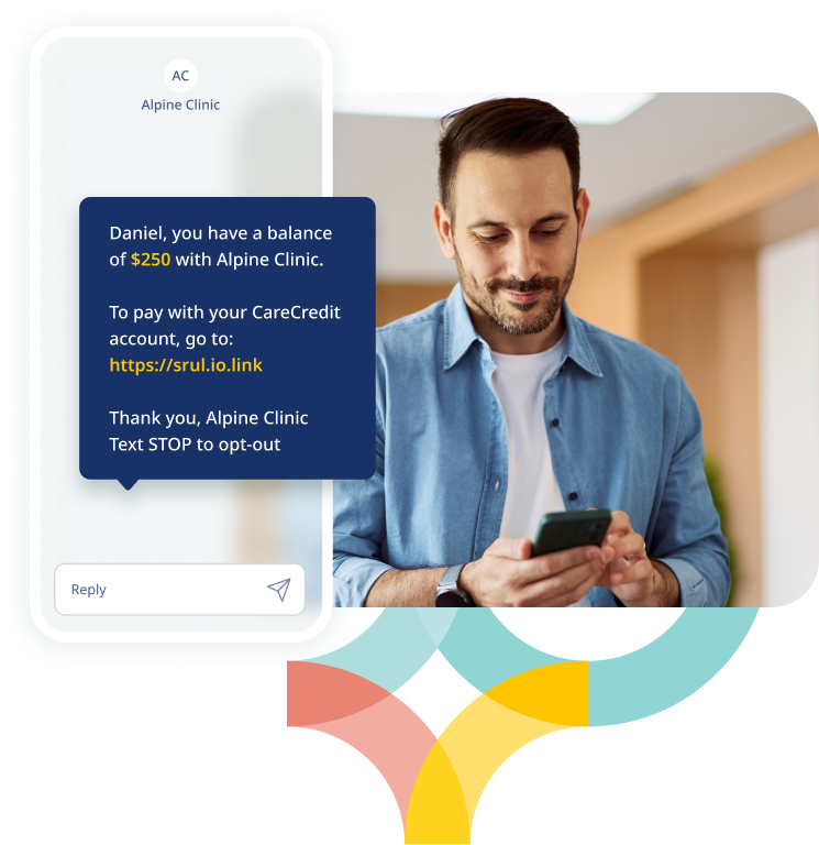 Patient in a medical office receives a payment text and uses their CareCredit credit card to pay the balance.