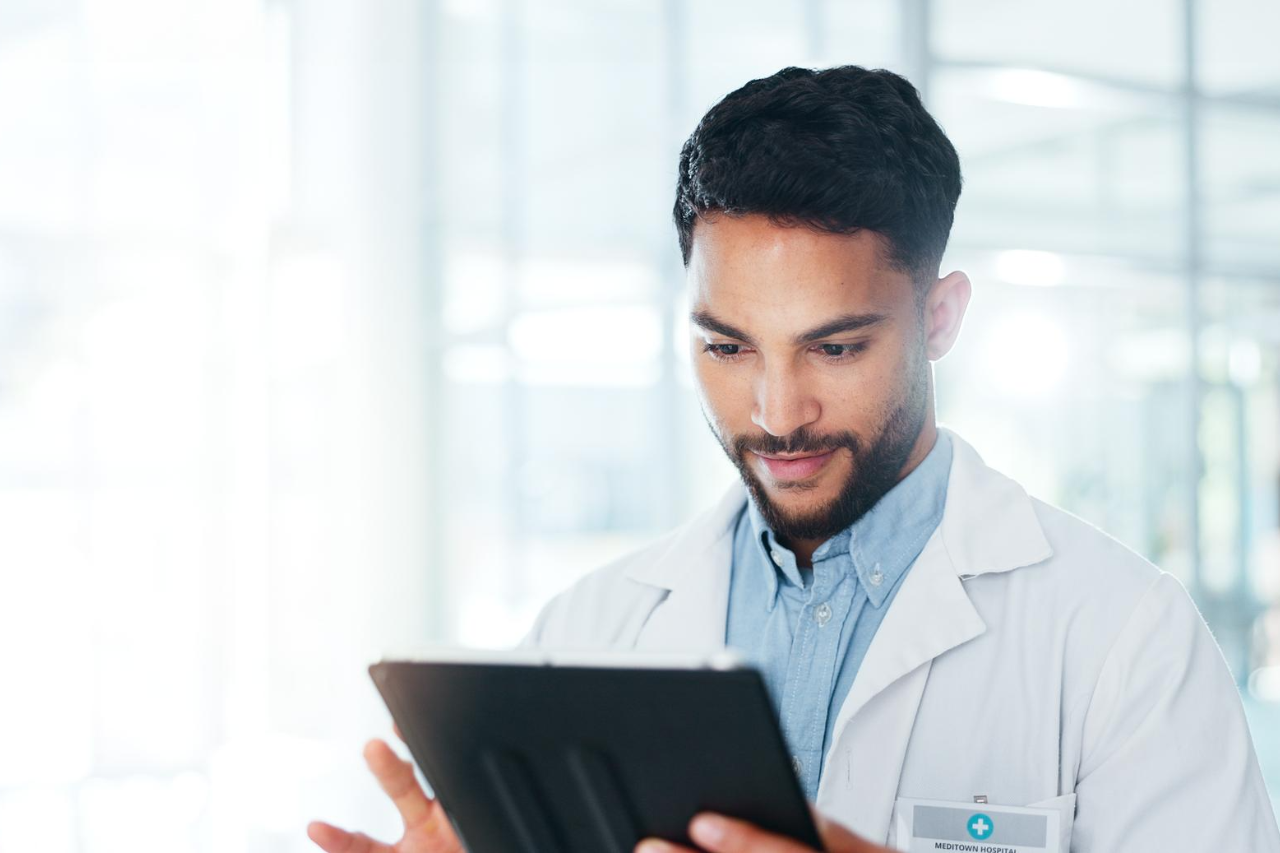 health practice doctor communicating with patient electronically via a device image